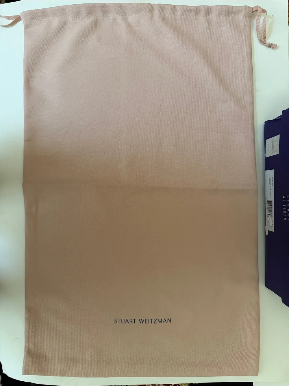 Stuart Weitzman light signs